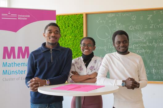 They are the first YAM fellows at the Cluster of Excellence Mathematics Münster: Junior Parfait Ngalamo, Marjory Mwanza and Abakar Assouna Mahamat (from left). 