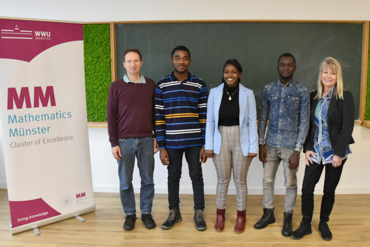 The YAM Fellows 2023/2024, Junior Parfait Ngalamo, Marjory Mwanza and Abakar Assouna Mahamat, with Raimar Wulkenhaar (academic coordinator) and Anke Pietsch (programme management assistant).