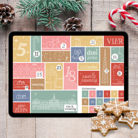 Bild von einem Tablet auf dem der Adventskalender der Universität Münster geöffnet ist.<address>© Uni MS</address>